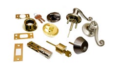 Portelli e serrature domestici del fabbro del hardware fotografie stock Portelli e serrature domestici del fabbro del hardware fotografie stock