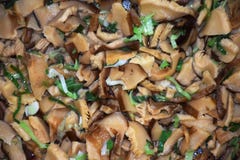 Portion of shitake braised with butter and garlic. Delicious oriental food made with fresh shitake stock photos Portion of shitake braised with butter and garlic. Delicious oriental food made with fresh shitake stock photos