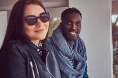 Portrait of an attractive stylish couple. African-American guy w royalty free stock photos Portrait of an attractive stylish couple. African-American guy w royalty free stock photos