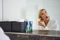 Portrait of attractive young adult woman applying royalty free stock photo Portrait of attractive young adult woman applying royalty free stock photo