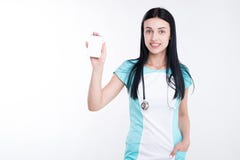 Portrait of an attractive young female doctor in white and coat royalty free stock images Portrait of an attractive young female doctor in white and coat royalty free stock images