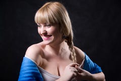 Portrait of beautiful blonde braiding a plait Royalty Free Stock Photography Portrait of beautiful blonde braiding a plait Royalty Free Stock Photography