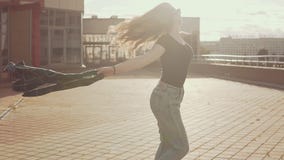 Portrait of beautiful brunette girl having fun at sunset outdoors in slow motion stock video Portrait of beautiful brunette girl having fun at sunset outdoors in slow motion stock video