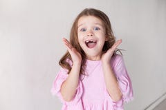 Portrait with beautiful fashionable girls in the room of the home children stock photo Portrait with beautiful fashionable girls in the room of the home children stock photo