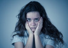 Close up portrait of teenager female suffering depression. Sad face, unhappiness human emotion royalty free stock images Close up portrait of teenager female suffering depression. Sad face, unhappiness human emotion royalty free stock images