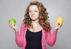 Portrait of beautiful woman with an apple and pear Royalty Free Stock Photo Portrait of beautiful woman with an apple and pear Royalty Free Stock Photo