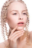 Portrait of a beautiful woman with curly blonde stock image Portrait of a beautiful woman with curly blonde stock image