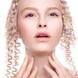 Portrait of a beautiful woman with curly blonde stock photo Portrait of a beautiful woman with curly blonde stock photo