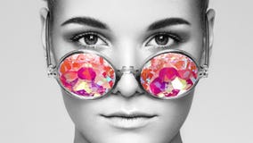 Portrait of beautiful young woman with colored glasses stock photography Portrait of beautiful young woman with colored glasses stock photography