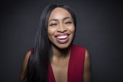 Portrait of a Black African American Woman Smiling and Laughing royalty free stock photo Portrait of a Black African American Woman Smiling and Laughing royalty free stock photo