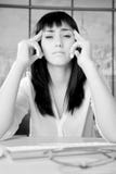 Portrait of business woman in office with strong headache black and white royalty free stock image Portrait of business woman in office with strong headache black and white royalty free stock image