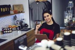 Experienced female administrative supervising looking to the camera with smile royalty free stock photography Experienced female administrative supervising looking to the camera with smile royalty free stock photography