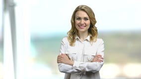 Portrait of charming office lady on blurred background.