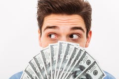 Portrait closeup of pleased guy with dark short hair covering hi royalty free stock image Portrait closeup of pleased guy with dark short hair covering hi royalty free stock image