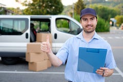 Portrait of confidence express courier stock images Portrait of confidence express courier stock images