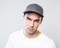 Portrait of confident young man in baseball cap royalty free stock image Portrait of confident young man in baseball cap royalty free stock image