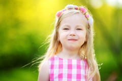 Portrait of cute little girl outdoors on warm and sunny summer day stock photography Portrait of cute little girl outdoors on warm and sunny summer day stock photography