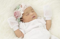 Portrait of cute newborn baby sleeping on white blanket royalty free stock image Portrait of cute newborn baby sleeping on white blanket royalty free stock image