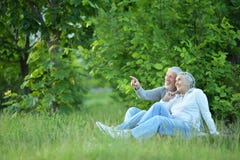 Portrait of cute senior couple in the park royalty free stock images Portrait of cute senior couple in the park royalty free stock images