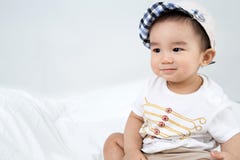 Portrait de bébé mignon asiatique de sourire Image libre de droits Portrait de bébé mignon asiatique de sourire Image libre de droits