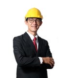 Portrait de jeune homme heureux d'ingénieur avec le casque antichoc sur le CCB blanc photos libres de droits Portrait de jeune homme heureux d'ingénieur avec le casque antichoc sur le CCB blanc photos libres de droits