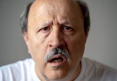 Portrait of disorientated and confused old man suffering from Alzheimer royalty free stock image Portrait of disorientated and confused old man suffering from Alzheimer royalty free stock image