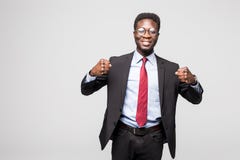 Portrait of an excited businessman with arms raised in success on white background royalty free stock photos Portrait of an excited businessman with arms raised in success on white background royalty free stock photos