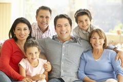 Portrait Of Extended Hispanic Family Relaxing At Home stock image Portrait Of Extended Hispanic Family Relaxing At Home stock image