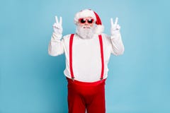 Portrait of funny funky fat overweight santa in modern eyeglasses with big abdomen belly make v-signs enjoy christmas