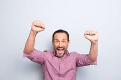 Portrait of handsome cheerful glad attractive man in casual chec stock image Portrait of handsome cheerful glad attractive man in casual chec stock image