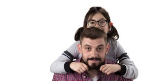 Portrait of handsome father and his cute daughter hugging, looking at camera and smiling royalty free stock image Portrait of handsome father and his cute daughter hugging, looking at camera and smiling royalty free stock image
