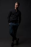 Portrait of handsome, man against dark background. stock image Portrait of handsome, man against dark background. stock image