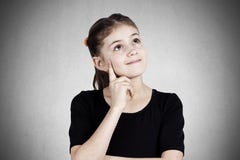 Portrait of a happy daydreaming little girl royalty free stock photo Portrait of a happy daydreaming little girl royalty free stock photo