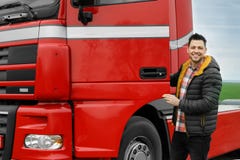 Portrait of happy driver opening door of modern truck stock photography Portrait of happy driver opening door of modern truck stock photography