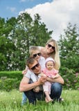 Portrait Of Happy Family In Garden stock image Portrait Of Happy Family In Garden stock image