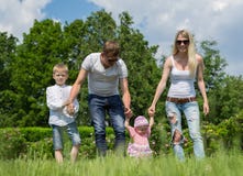Portrait Of Happy Family In Garden royalty free stock image Portrait Of Happy Family In Garden royalty free stock image