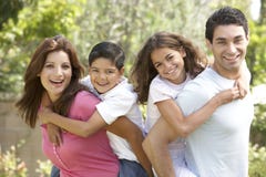 Portrait of Happy Family In Park Royalty Free Stock Photography Portrait of Happy Family In Park Royalty Free Stock Photography