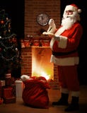 Portrait of happy Santa Claus standing at his room at home royalty free stock photography Portrait of happy Santa Claus standing at his room at home royalty free stock photography