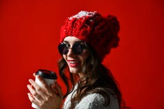 Beautiful woman holding paper coffee cup stock photography Beautiful woman holding paper coffee cup stock photography