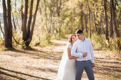 https://thumbs.dreamstime.com/t/portrait-just-married-wedding-couple-happy-bride-groom-standing-beach-kissing-smiling-laughing-having-fun-autumn-pa-50849439.jpg