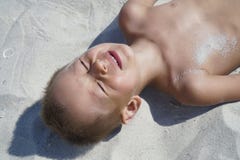 Portrait of little boy smiling on the background of the sea beach. royalty free stock image Portrait of little boy smiling on the background of the sea beach. royalty free stock image