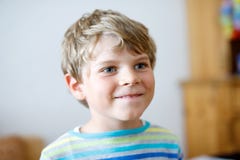 Portrait of little cute school kid boy in colorful clothes. Happy positive child. stock image Portrait of little cute school kid boy in colorful clothes. Happy positive child. stock image