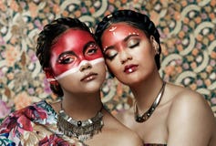 Portrait, makeup and tribal of women for culture, tradition and heritage celebration in studio. Creativity, girls and