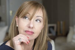 Portrait of mature woman thinking. stock photography Portrait of mature woman thinking. stock photography