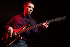 Portrait of musician with bass guitar royalty free stock photos Portrait of musician with bass guitar royalty free stock photos