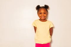 Portrait of nice little black girl smile over wall royalty free stock photos Portrait of nice little black girl smile over wall royalty free stock photos