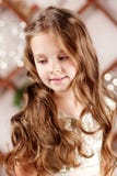Portrait Of A Cute Long-haired Little Girl In Dress. Close Up Picture Royalty Free Stock Photo