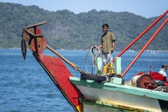 Portrait Of A Malaysian Male Worker On The Fishing Boat In Kota Kinabalu, Sabah, Malaysia Stock Images
