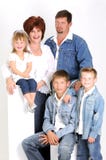Portrait Of A Young Family With Three Children Stock Image