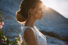 Portrait Of Beautiful And Sensual Blonde Model Girl With Modeling Stylish Hairstyle In Fashionable White Lace Dress Posing At The Royalty Free Stock Photo Portrait Of Beautiful And Sensual Blonde Model Girl With Modeling Stylish Hairstyle In Fashionable White Lace Dress Posing At The Royalty Free Stock Photo